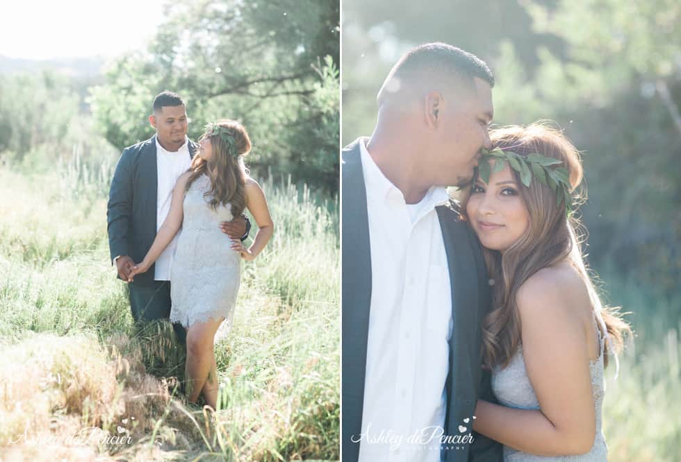 A fiance kissing his bride to be