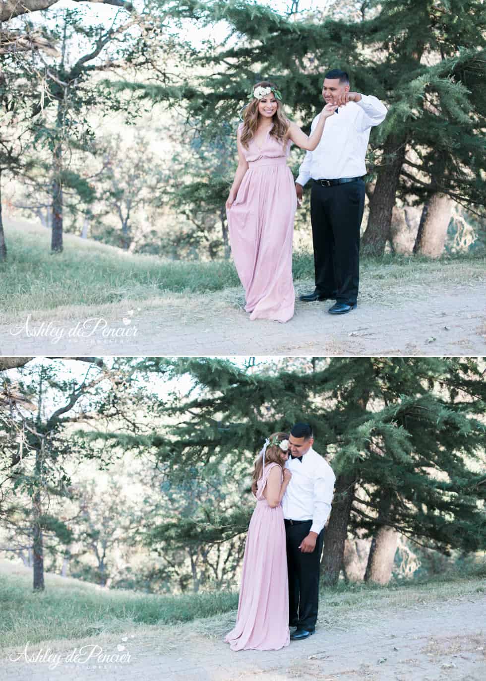 A man and woman walking on a gravel road