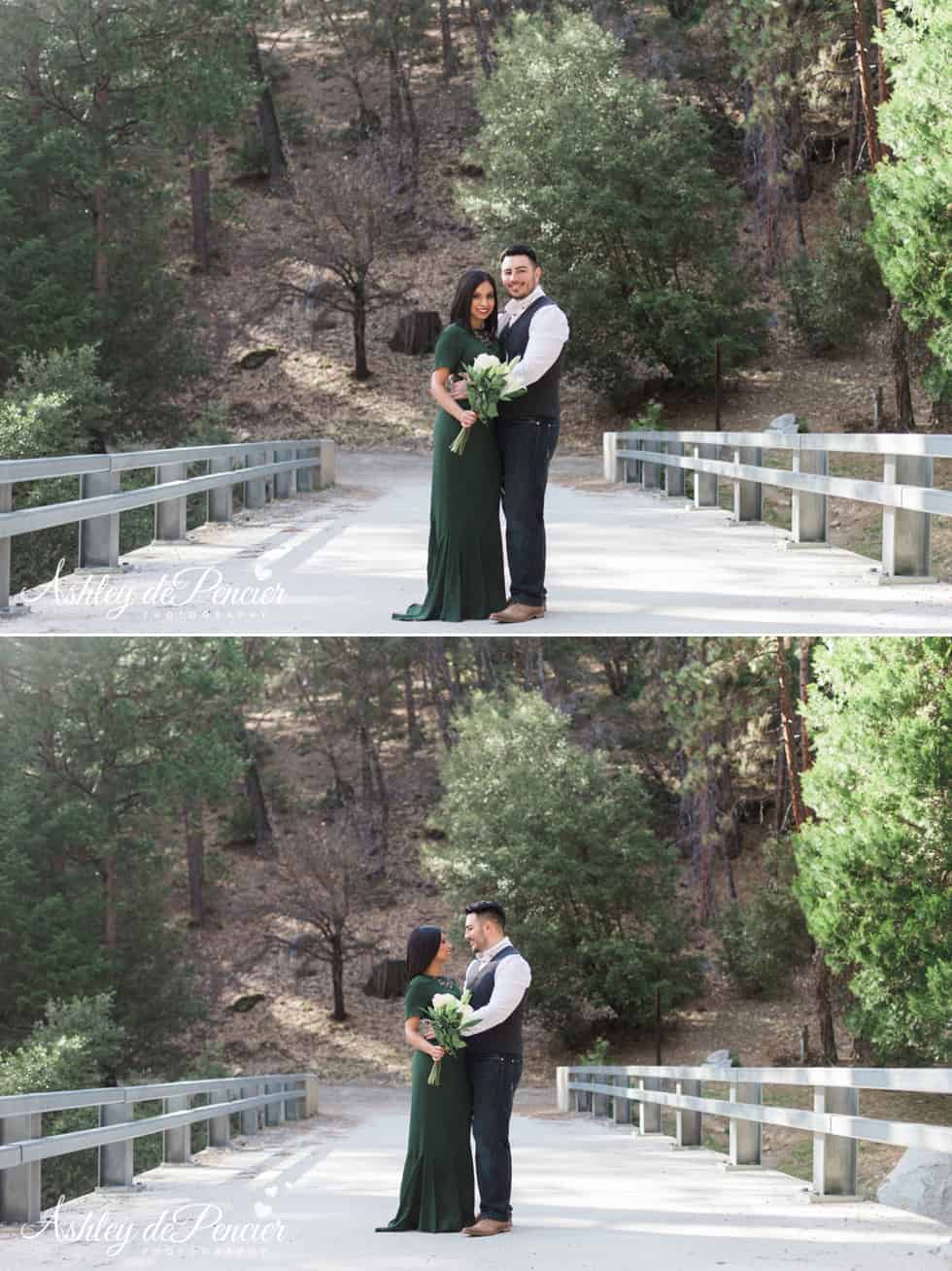 Engaged couple standing on a bridge