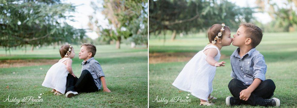 Two siblings kissing