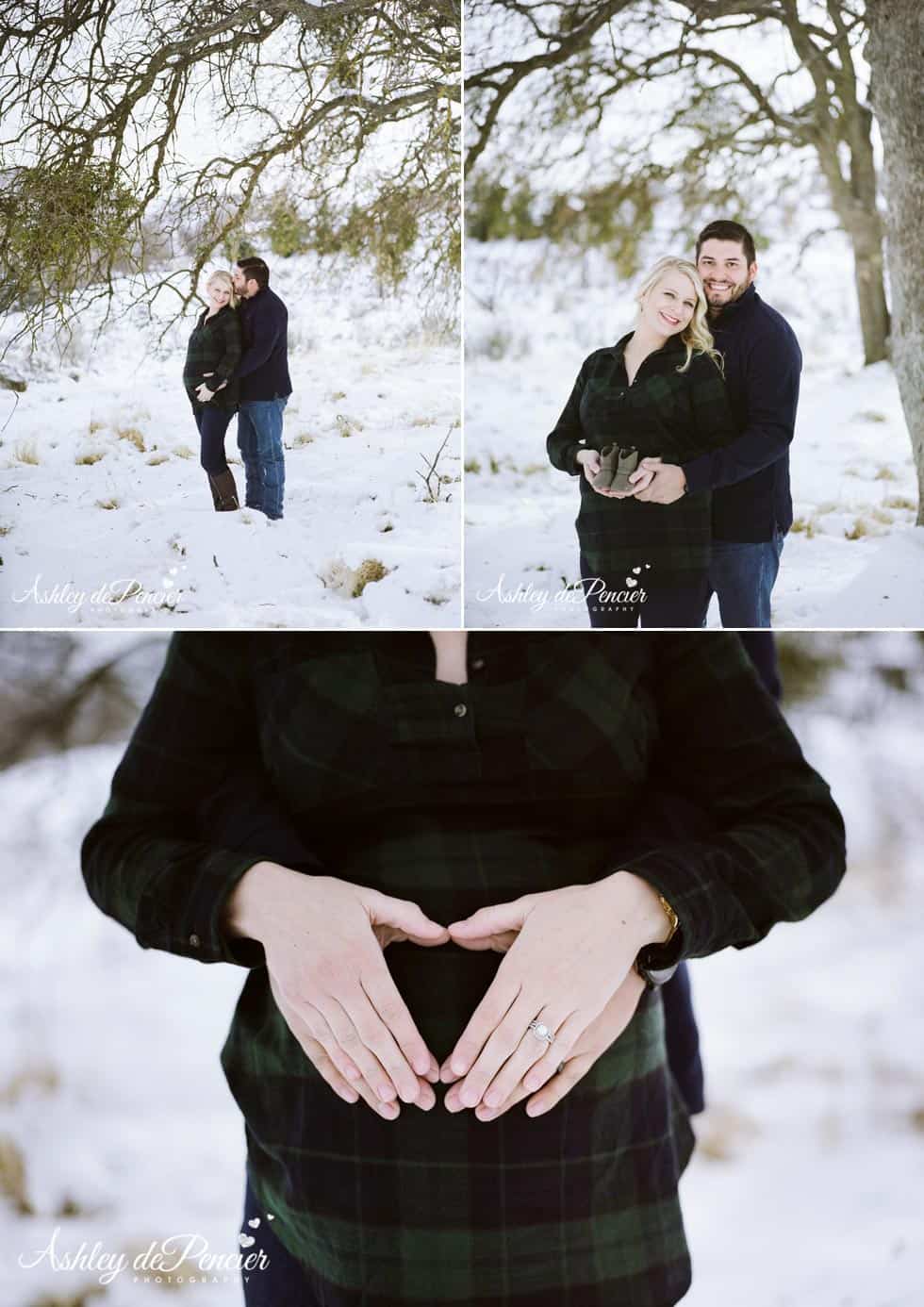 Pregnant couple standing in the snow
