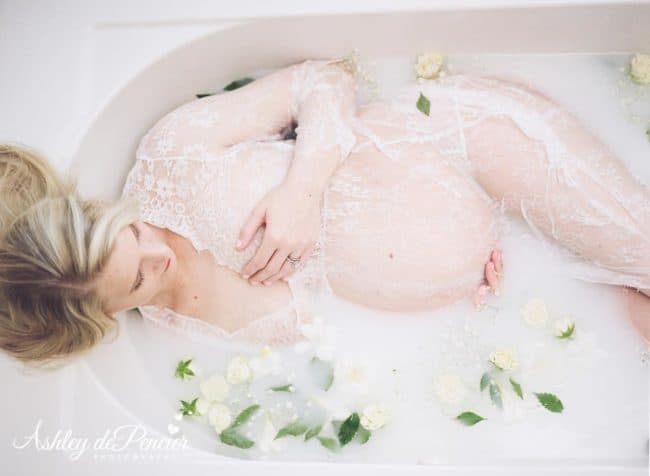 maternity portraits of a woman in a milk bath