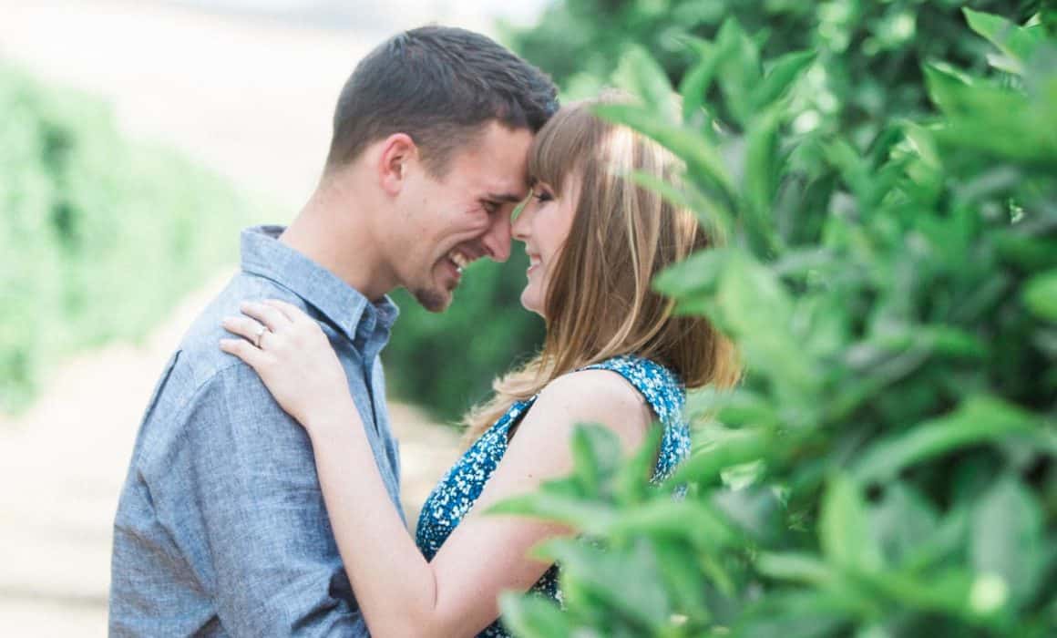 A guy and a girl kissing