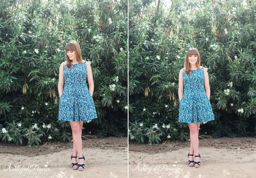 woman standing outside in a blue dress